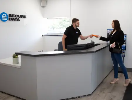 An image of our data recovery staff helping a customer.