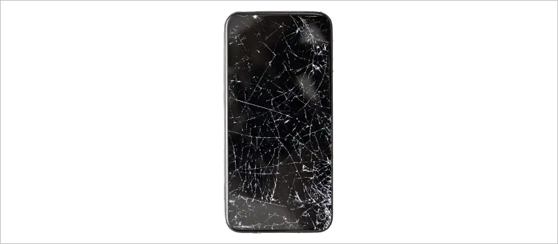 An image of a smartphone with a cracked screen.