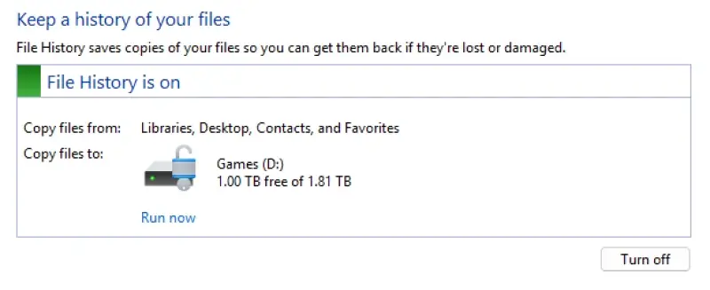 A screenshot showing how to run File History on Windows 11.