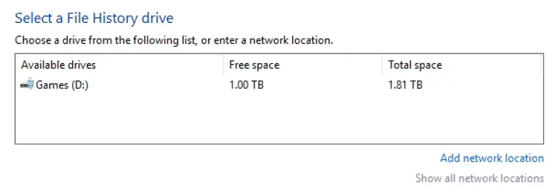 A screenshot showing how to select drives in File History on Windows 11.