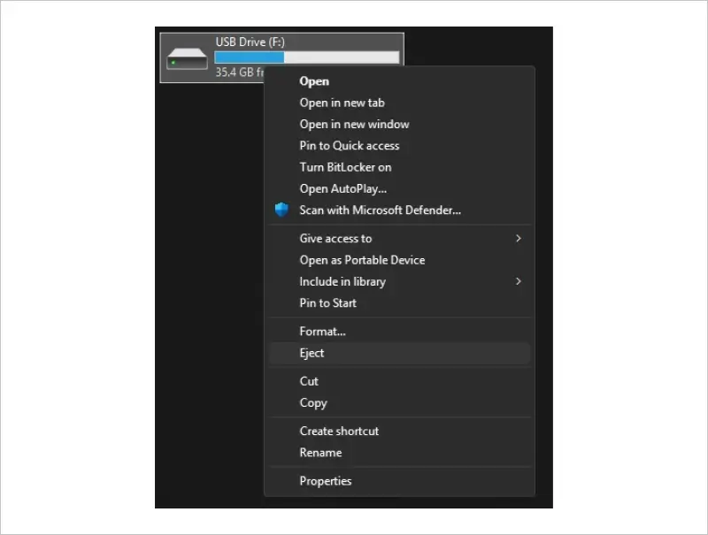 An image showing how to eject a USB drive from a PC.
